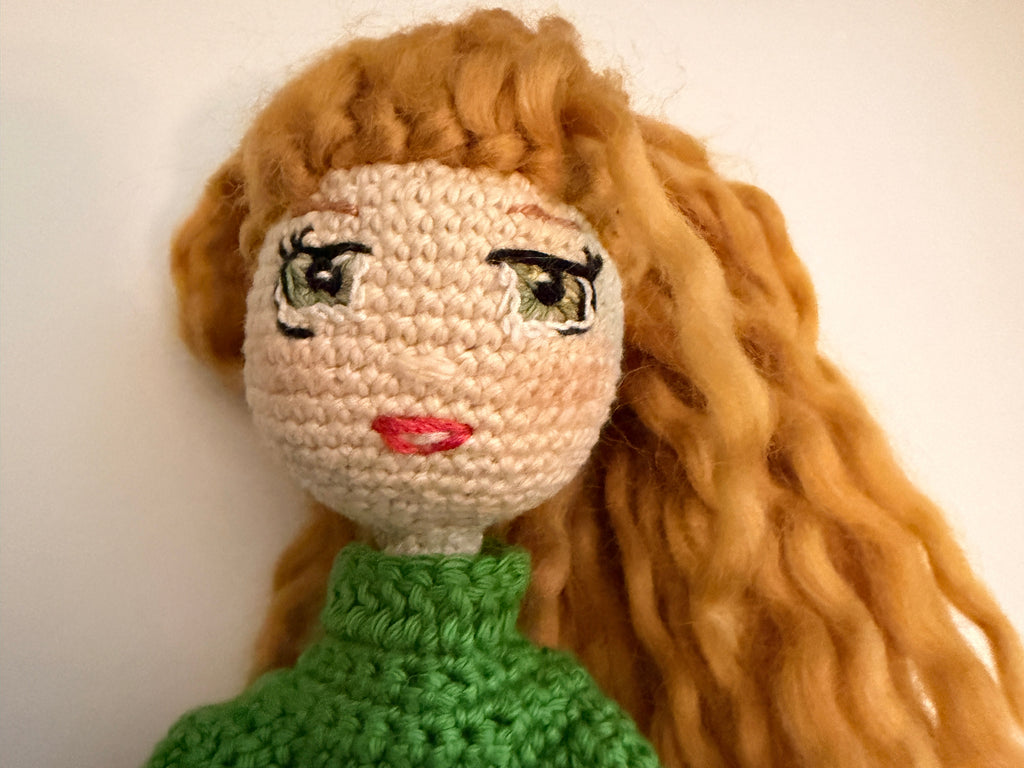 Lovely Lori – 11” Handmade Crochet Doll with Green Sweater & Pleated Skirt (Ages 8–12+)