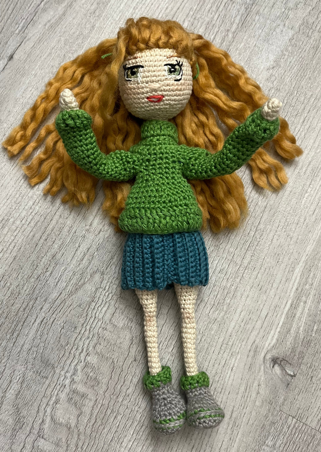 Lovely Lori – 11” Handmade Crochet Doll with Green Sweater & Pleated Skirt (Ages 8–12+)