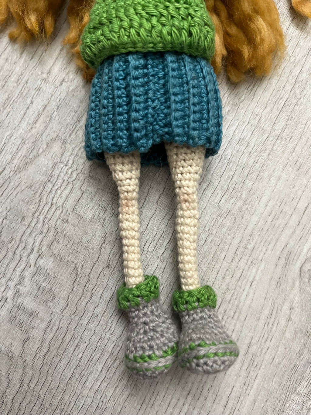 Lovely Lori – 11” Handmade Crochet Doll with Green Sweater & Pleated Skirt (Ages 8–12+)