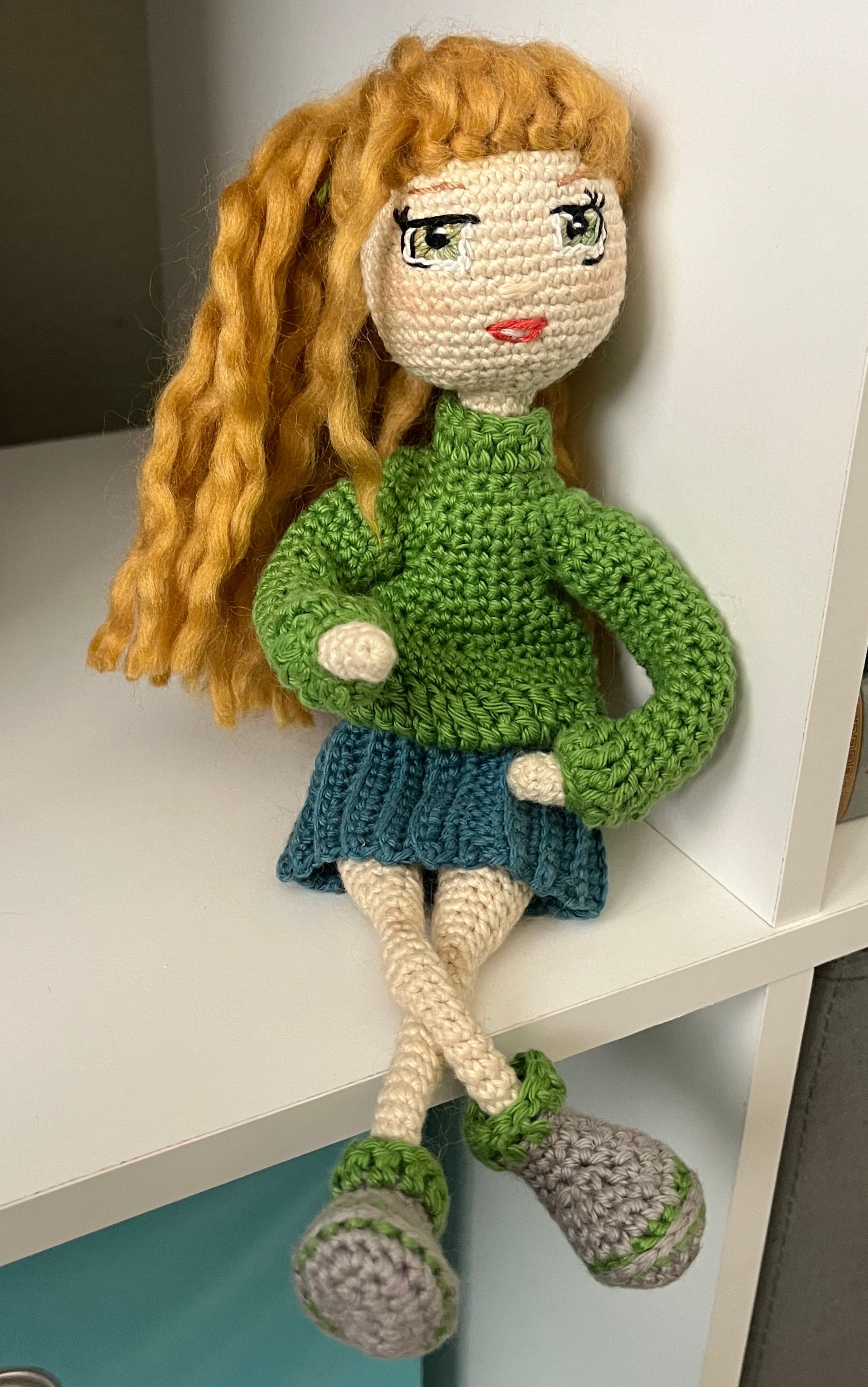 Lovely Lori – 11” Handmade Crochet Doll with Green Sweater & Pleated Skirt (Ages 8–12+)